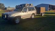 2006 Landcruiser 100 Series with Caged Trailer